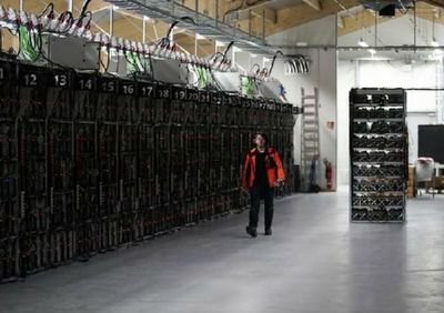 A modern mining farm powered by solar panels, showcasing a sustainable approach to cryptocurrency mining.
