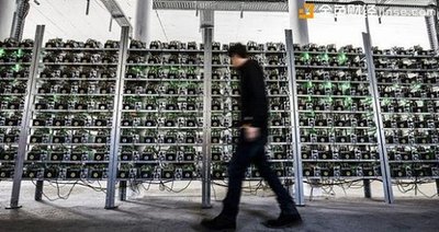 A mining farm with rows of powerful computers operating at full capacity, taking advantage of Canada's cool climate and inexpensive hydroelectric power.